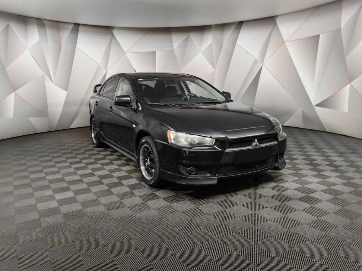 Купить Mitsubishi Lancer с пробегом. Фото: #2