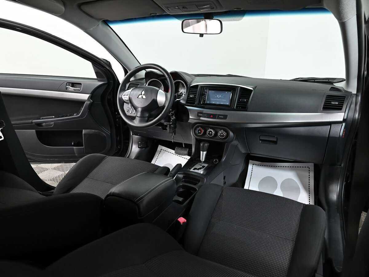 Купить Mitsubishi Lancer с пробегом. Фото: #4