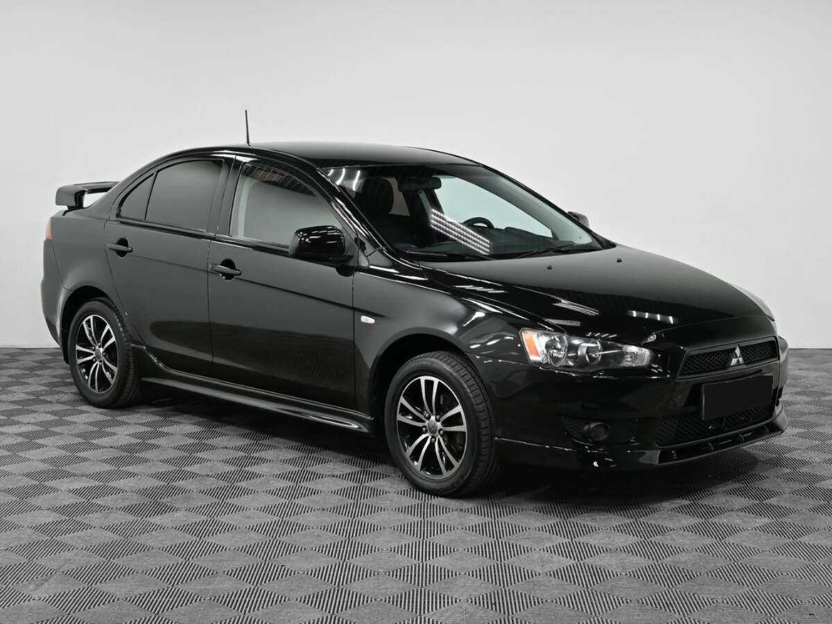 Купить Mitsubishi Lancer с пробегом. Фото: #2