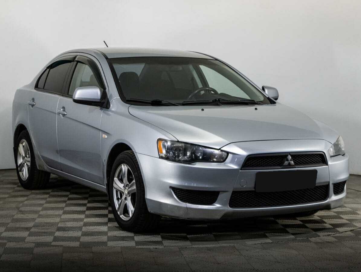 Купить Mitsubishi Lancer с пробегом. Фото: #2