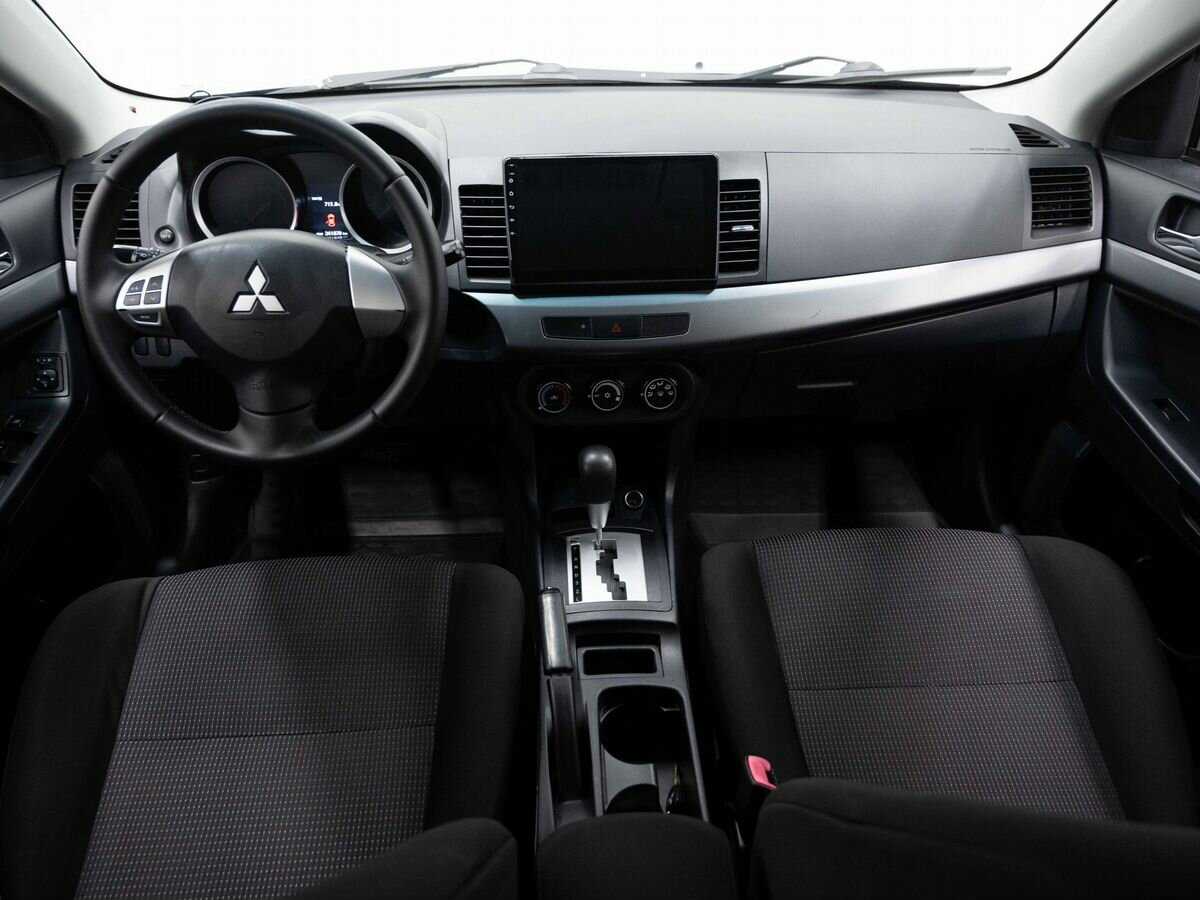 Купить Mitsubishi Lancer с пробегом. Фото: #12