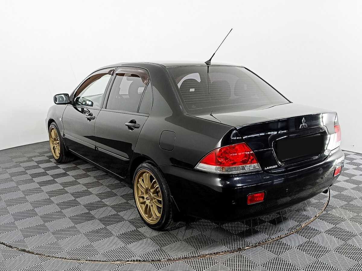 Купить Mitsubishi Lancer с пробегом. Фото: #6