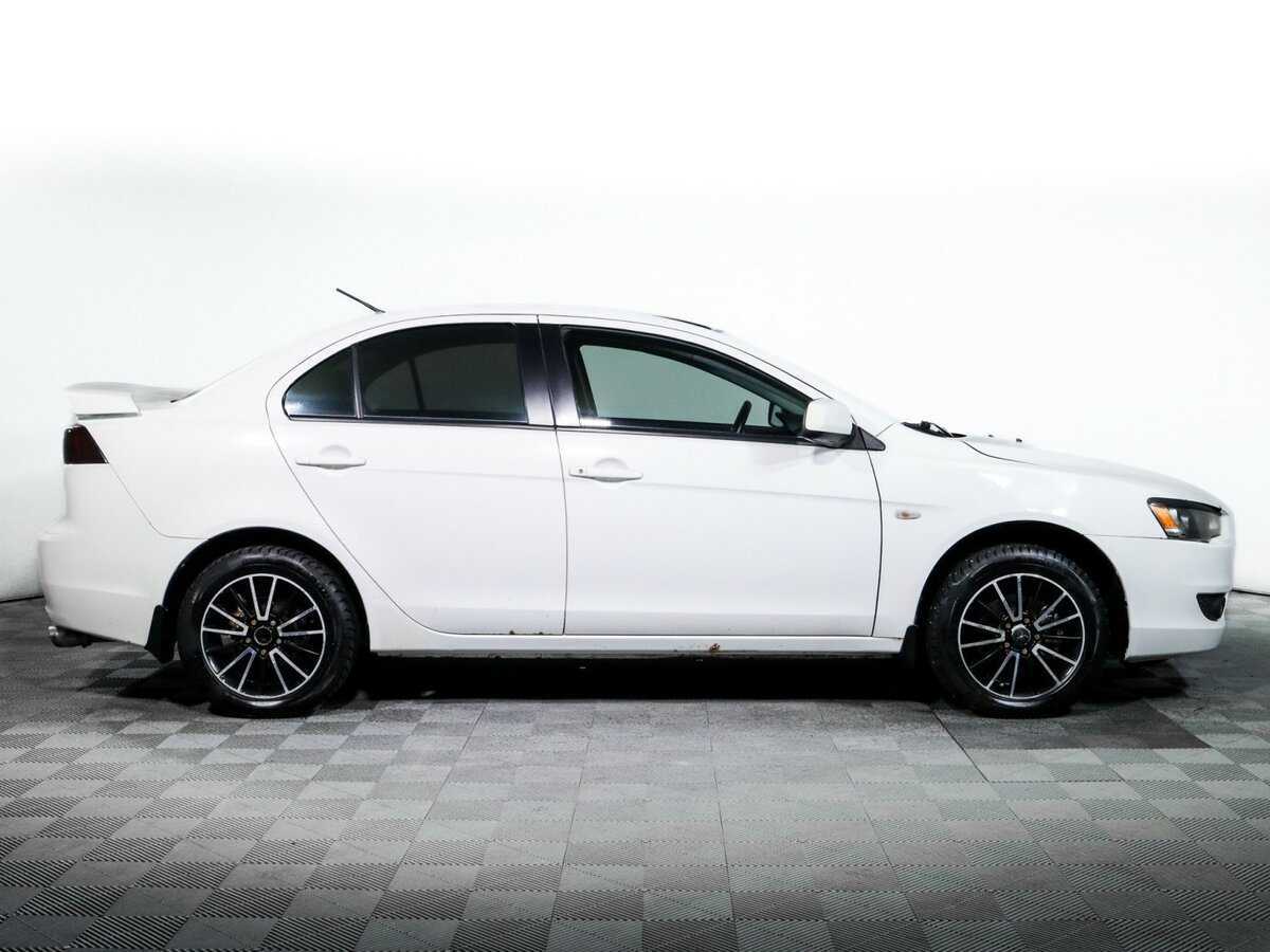 Купить Mitsubishi Lancer с пробегом. Фото: #3
