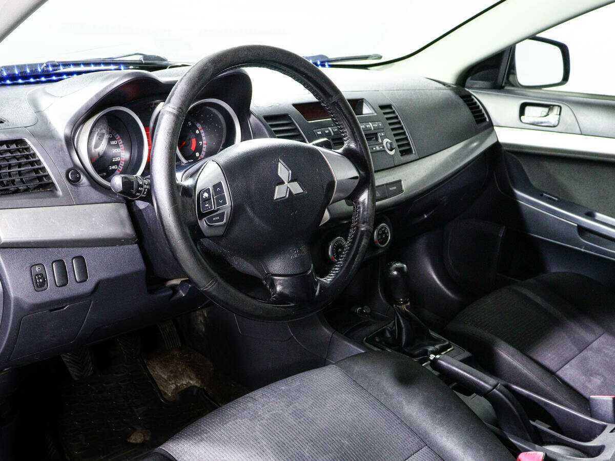 Купить Mitsubishi Lancer с пробегом. Фото: #11