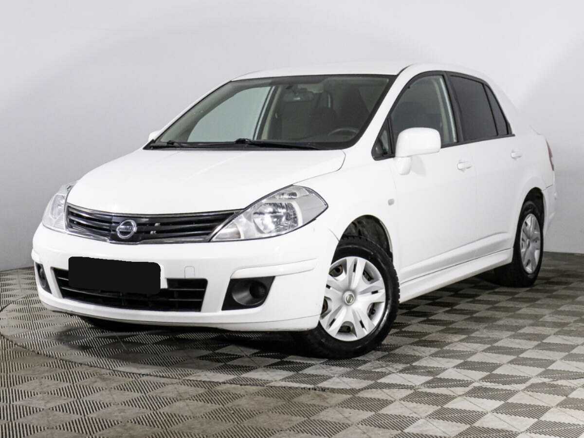 Купить Nissan Tiida с пробегом. Посмотреть фото