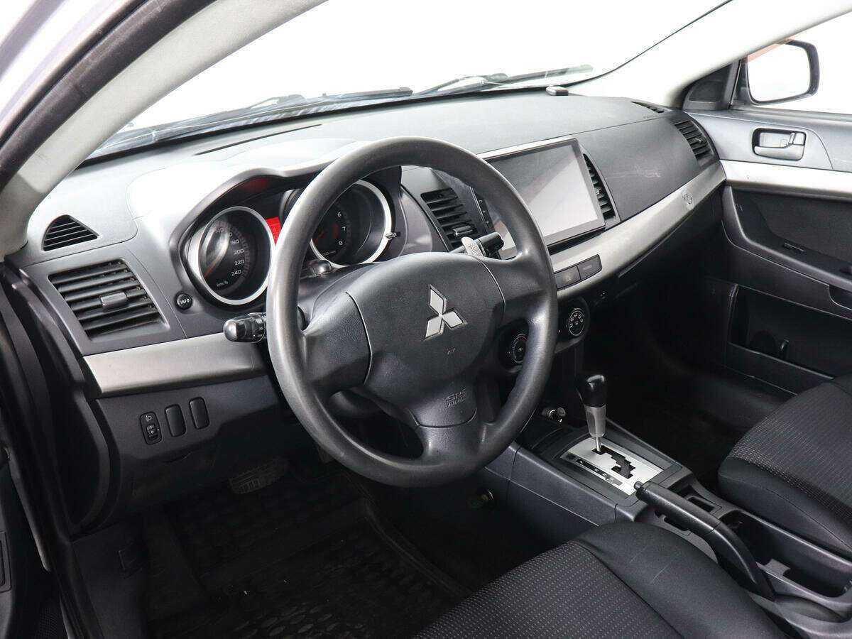 Купить Mitsubishi Lancer с пробегом. Фото: #8