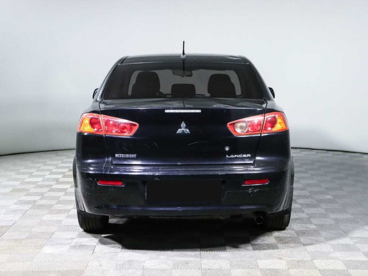 Купить Mitsubishi Lancer с пробегом. Фото: #4