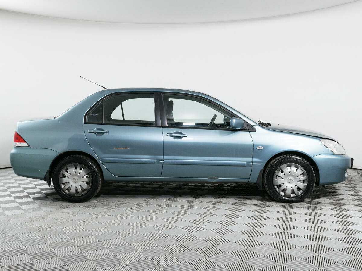 Купить Mitsubishi Lancer с пробегом. Фото: #3