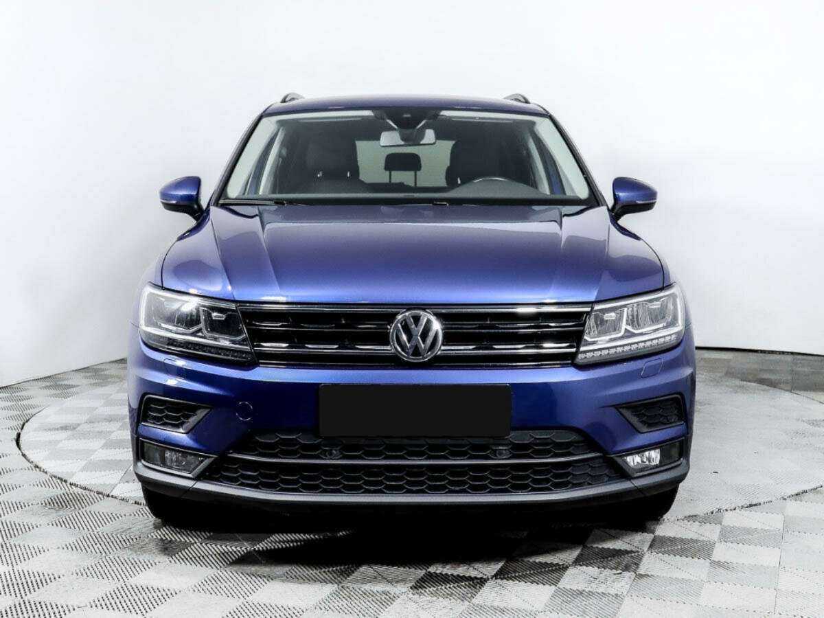 Купить Volkswagen Tiguan с пробегом. Посмотреть фото