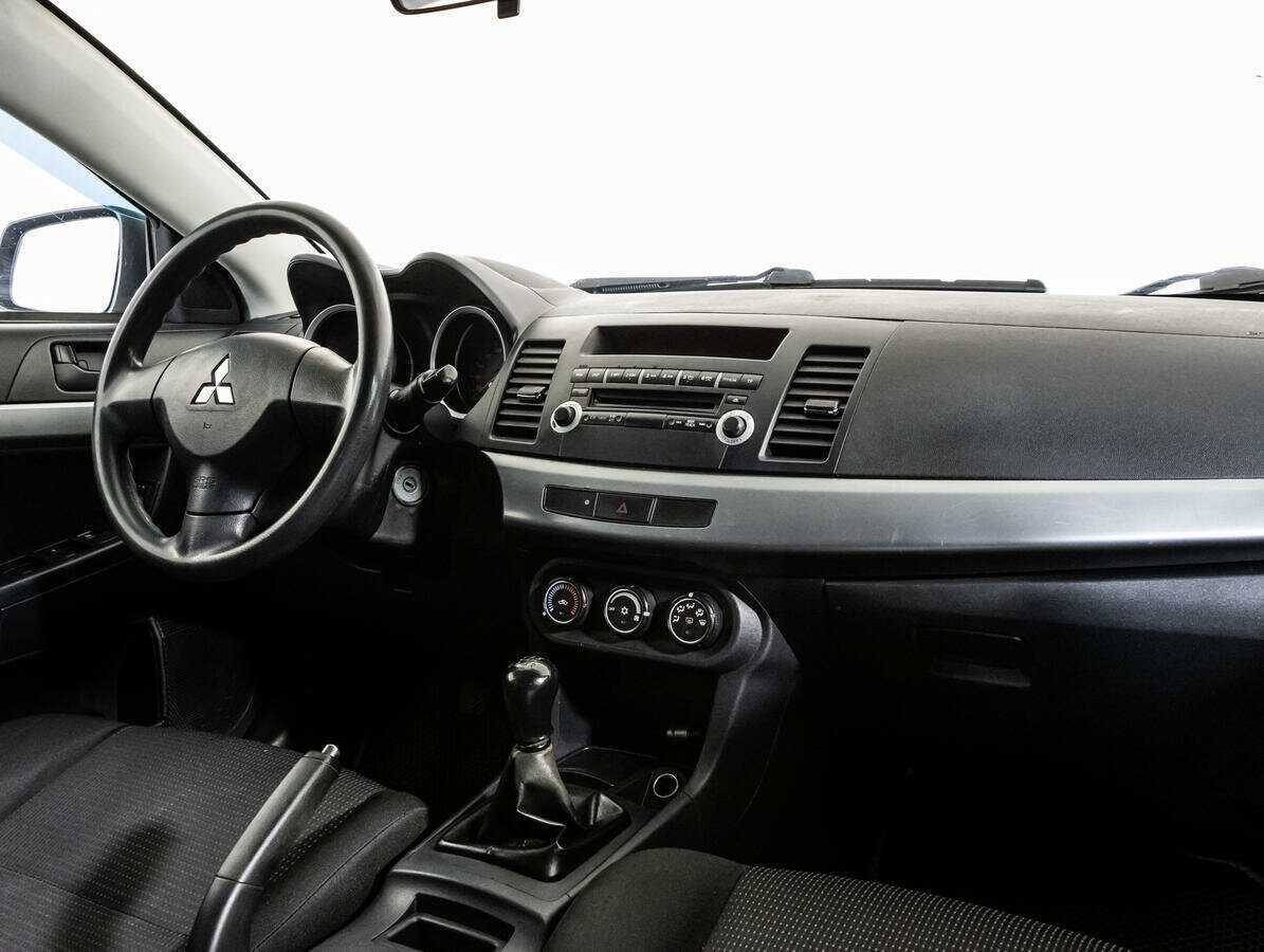 Купить Mitsubishi Lancer с пробегом. Фото: #8