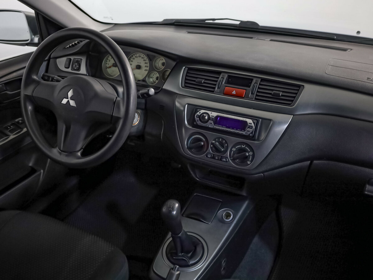 Купить Mitsubishi Lancer с пробегом. Фото: #6
