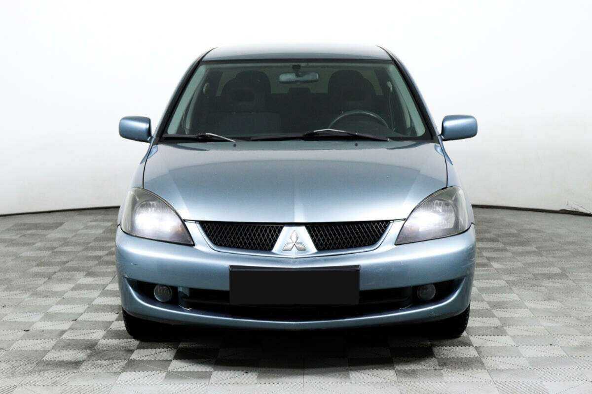 Купить Mitsubishi Lancer с пробегом. Фото: #1