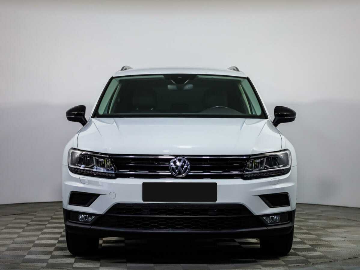 Купить Volkswagen Tiguan с пробегом. Посмотреть фото