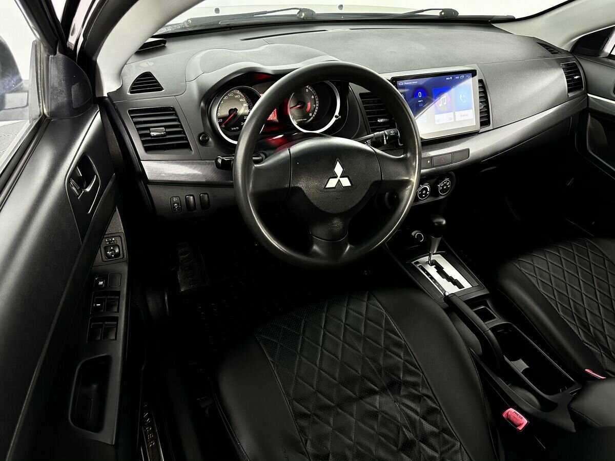 Купить Mitsubishi Lancer с пробегом. Фото: #6