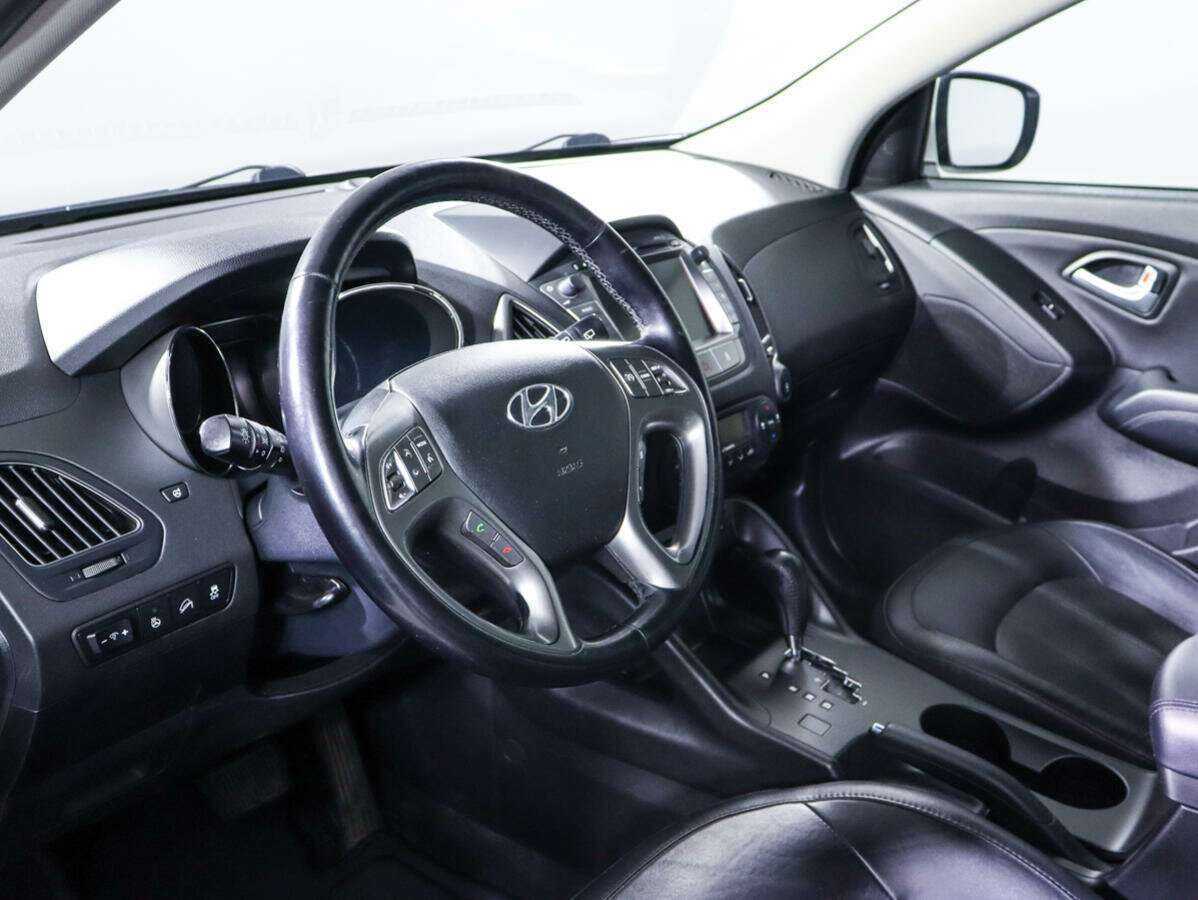 Купить Hyundai ix35 с пробегом. Фото: #11