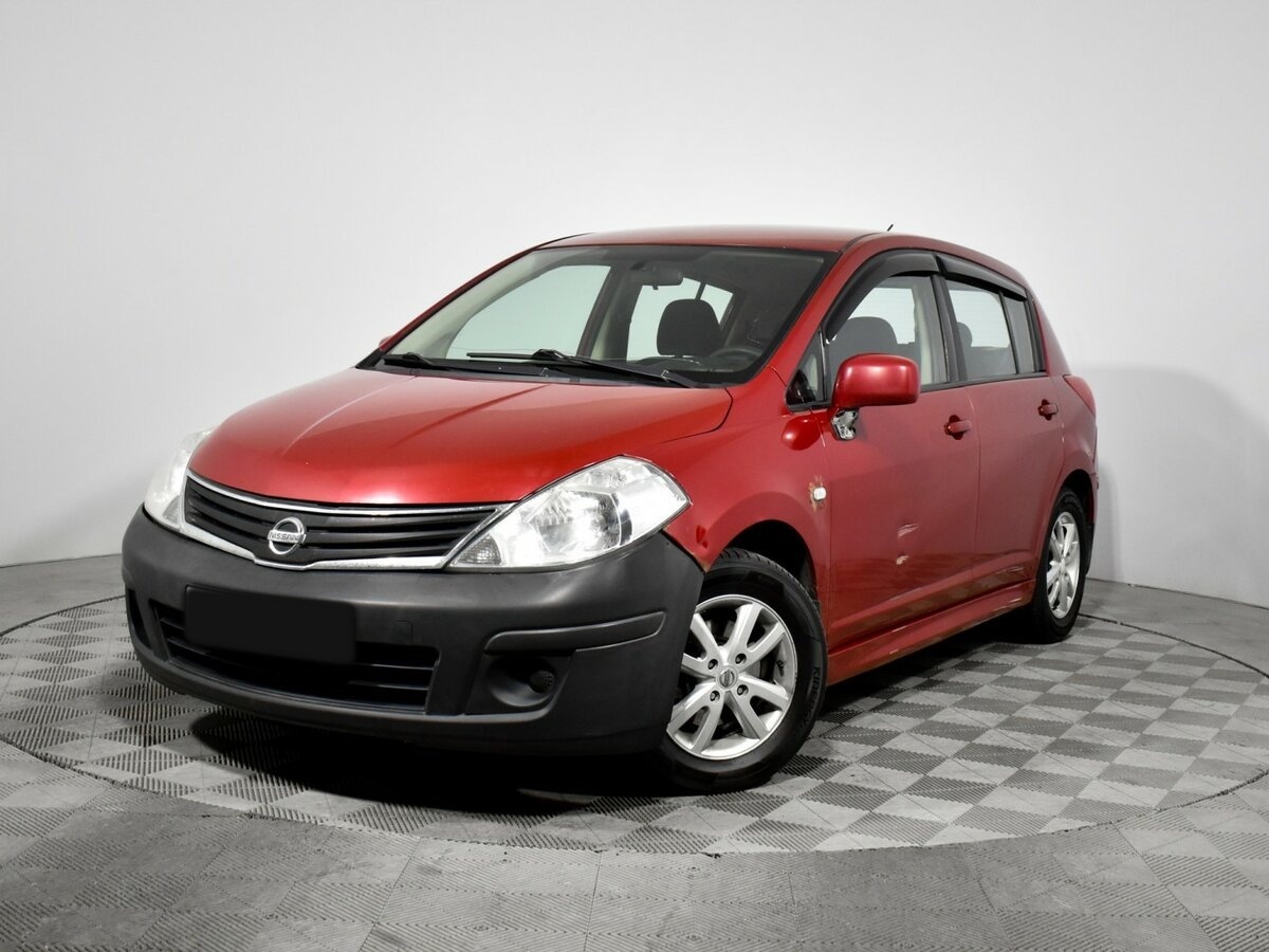 Купить Nissan Tiida с пробегом. Посмотреть фото