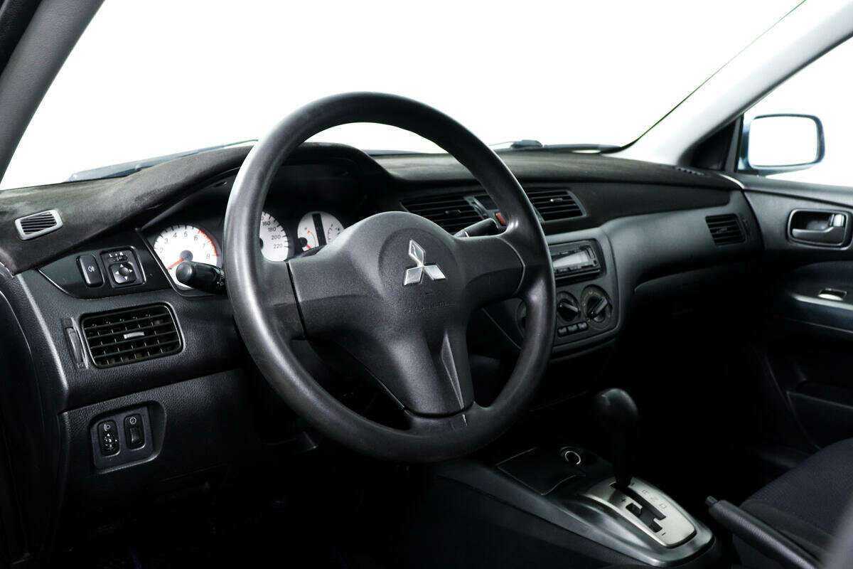 Купить Mitsubishi Lancer с пробегом. Фото: #12