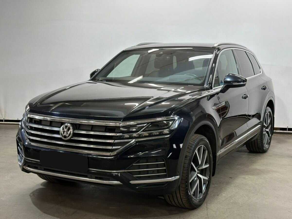 Купить Volkswagen Touareg с пробегом. Посмотреть фото