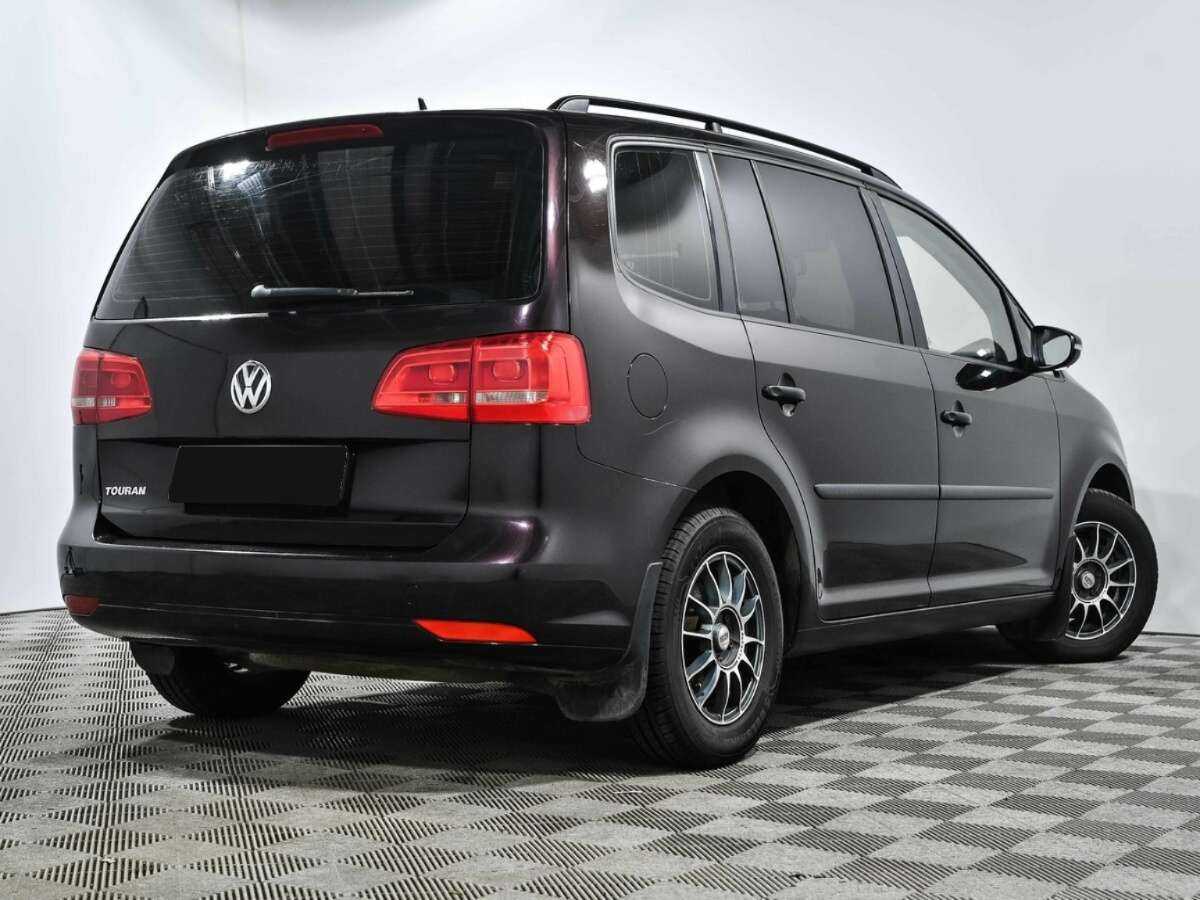 Купить Volkswagen Touran с пробегом. Фото: #3
