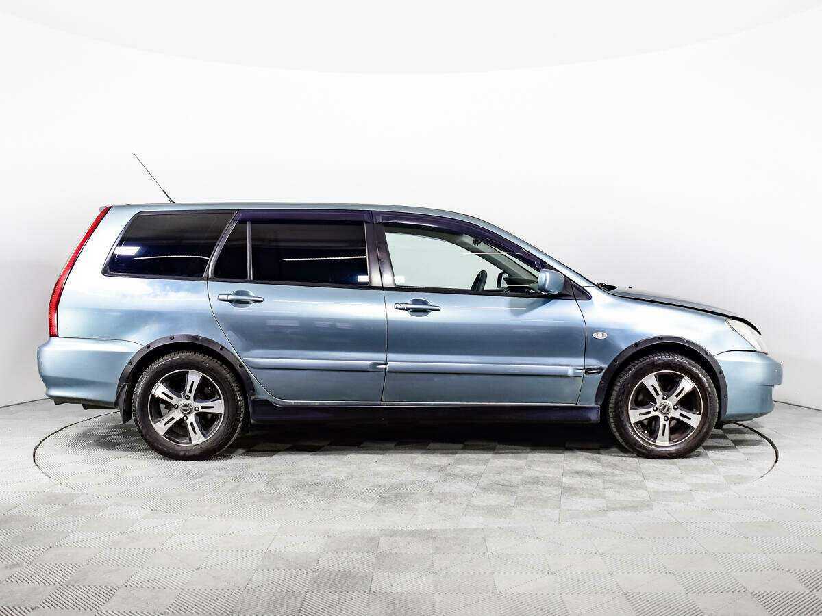 Купить Mitsubishi Lancer с пробегом. Фото: #3
