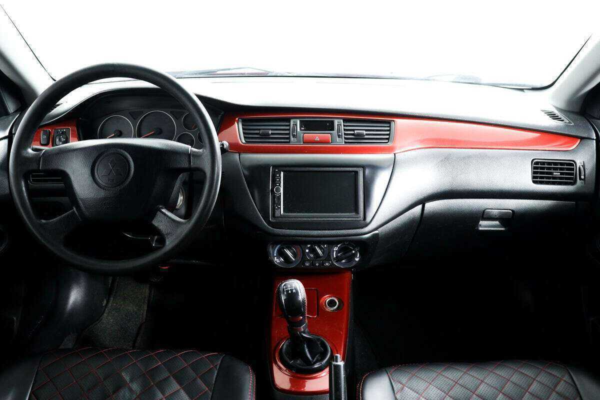 Купить Mitsubishi Lancer с пробегом. Фото: #10