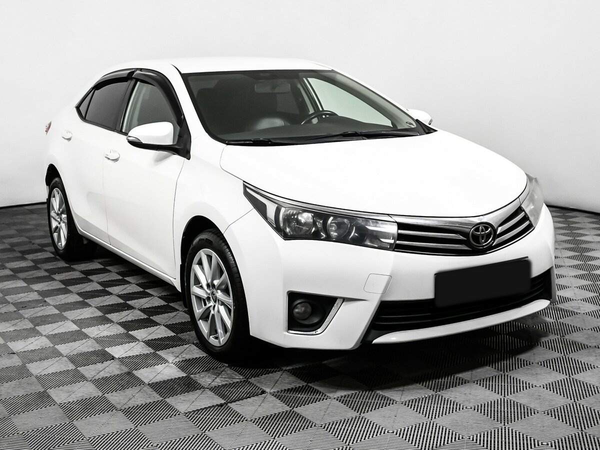 Купить Toyota Corolla с пробегом. Фото: #2