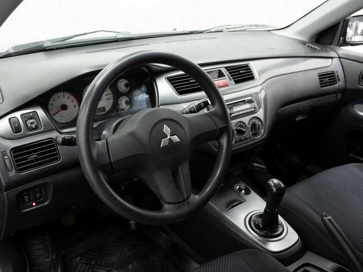 Купить Mitsubishi Lancer с пробегом. Фото: #6