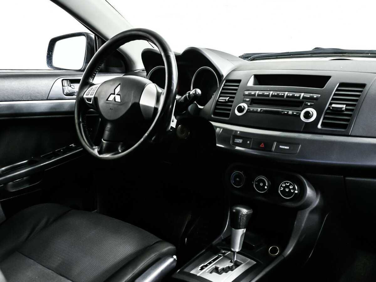 Купить Mitsubishi Lancer с пробегом. Фото: #8