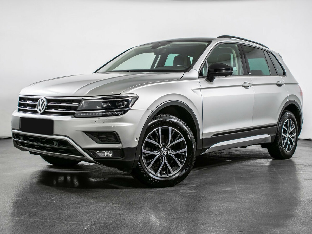Купить Volkswagen Tiguan с пробегом. Посмотреть фото