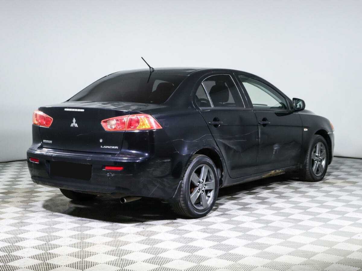 Купить Mitsubishi Lancer с пробегом. Фото: #3