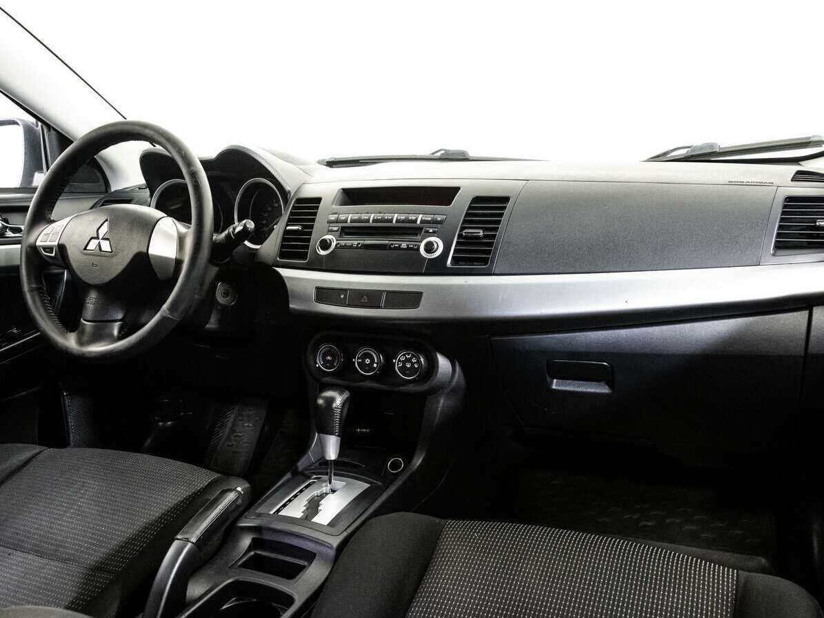 Купить Mitsubishi Lancer с пробегом. Фото: #6