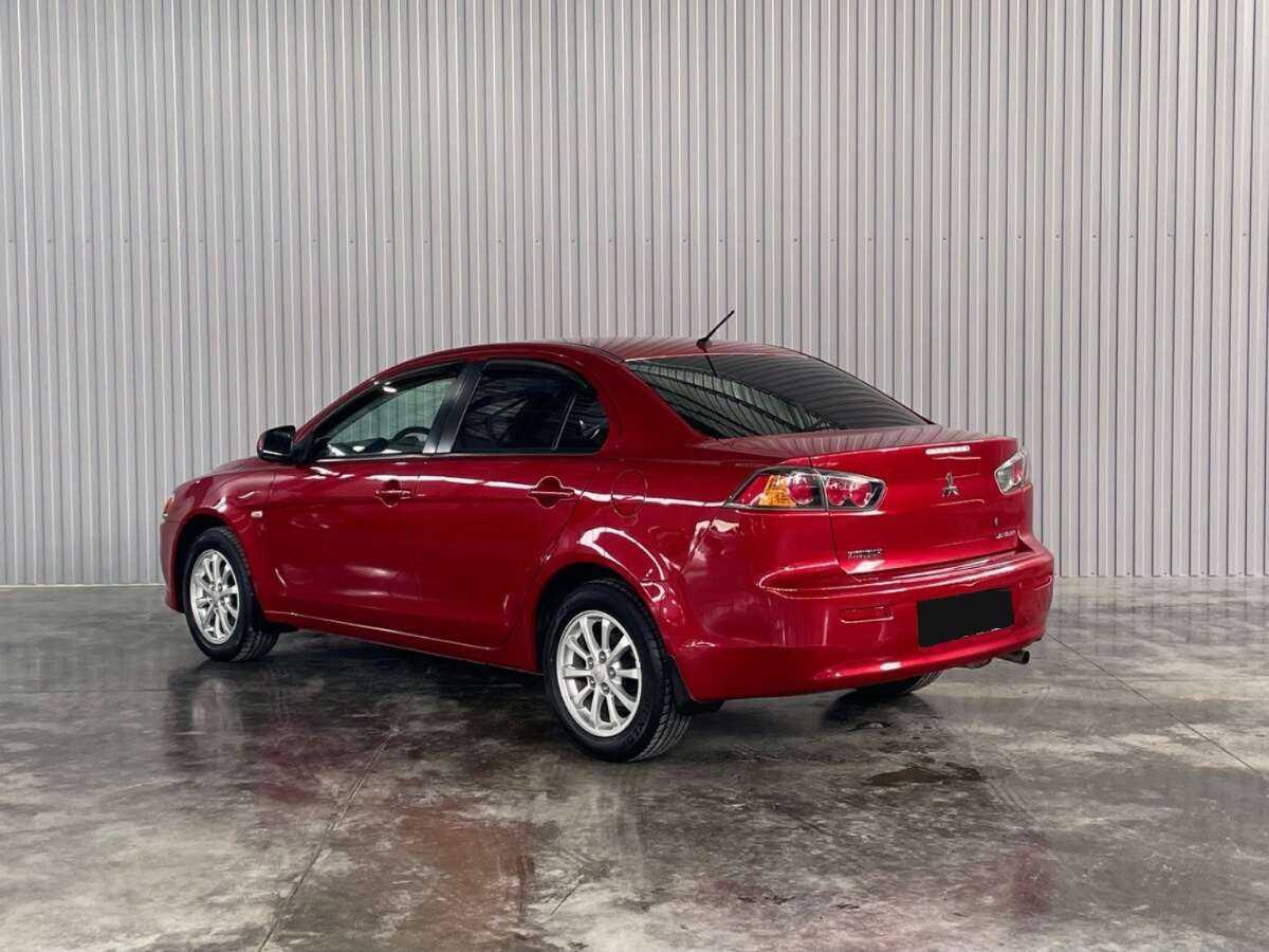 Купить Mitsubishi Lancer с пробегом. Фото: #5