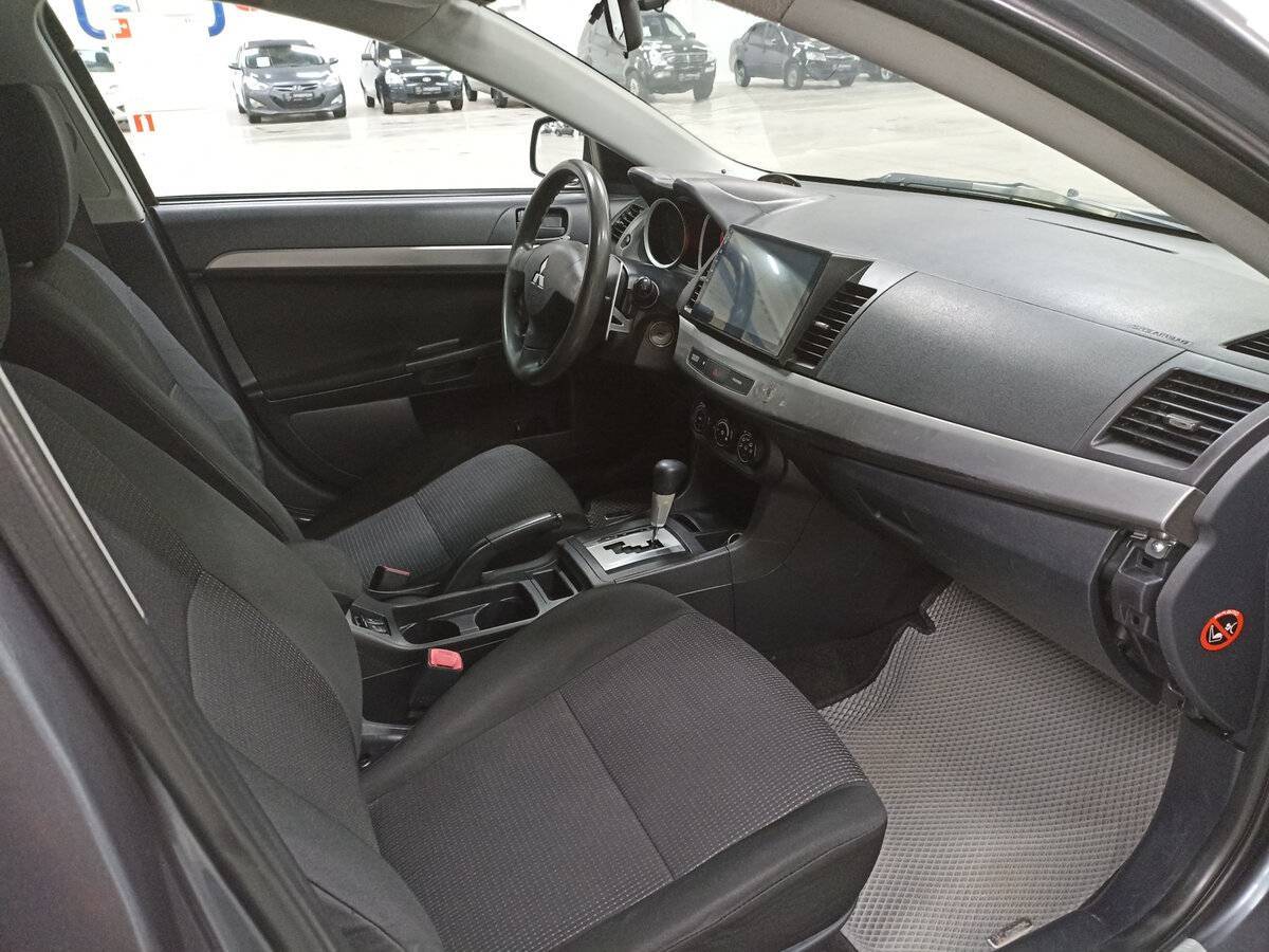 Купить Mitsubishi Lancer с пробегом. Фото: #10