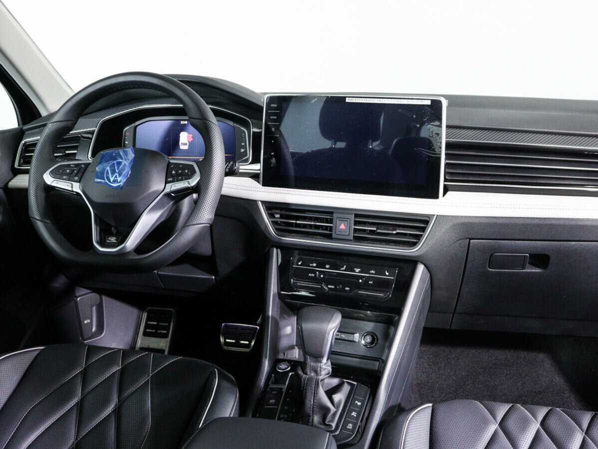 Купить Volkswagen Tiguan с пробегом. Фото: #9