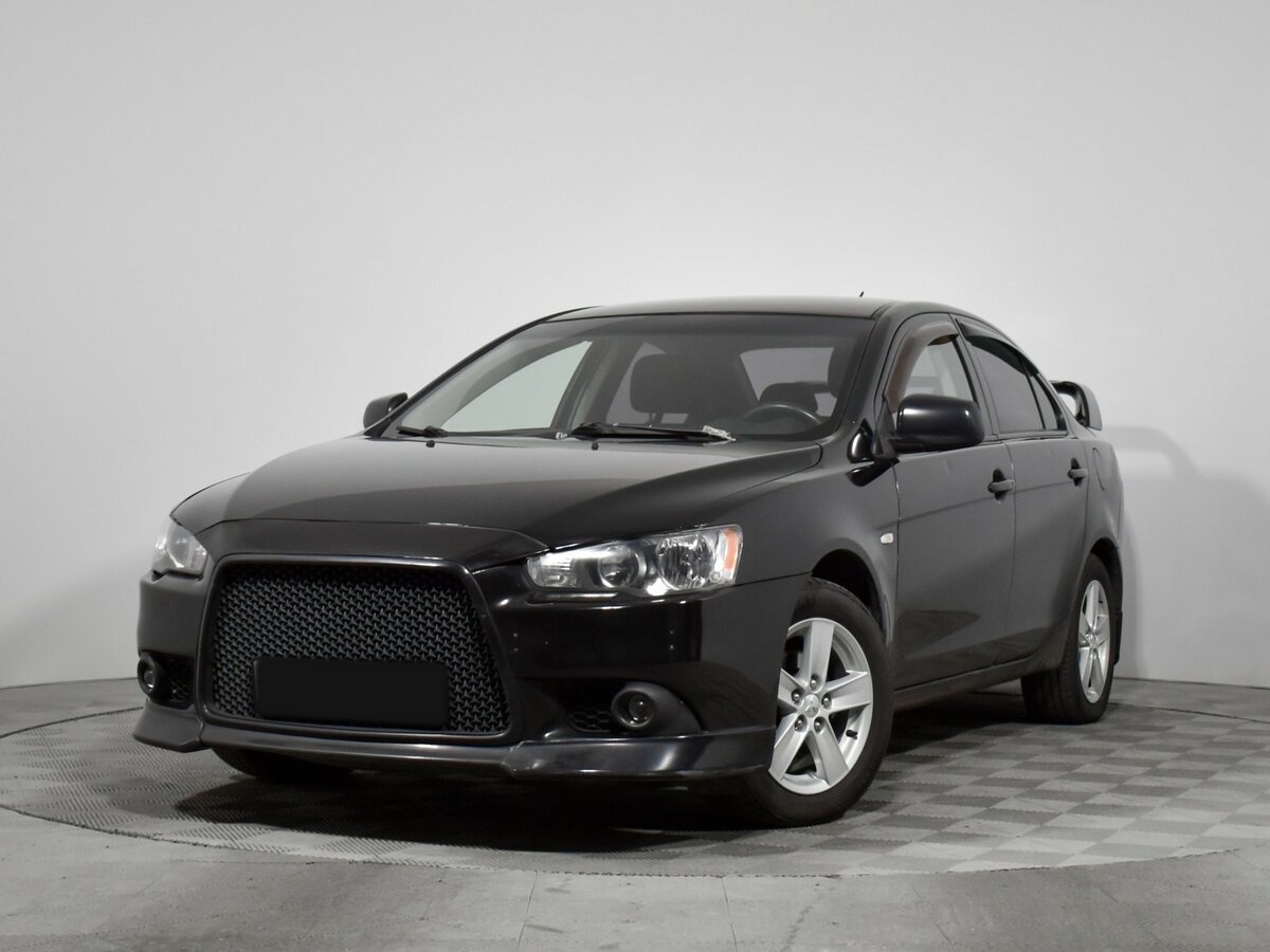 Купить Mitsubishi Lancer с пробегом. Посмотреть фото