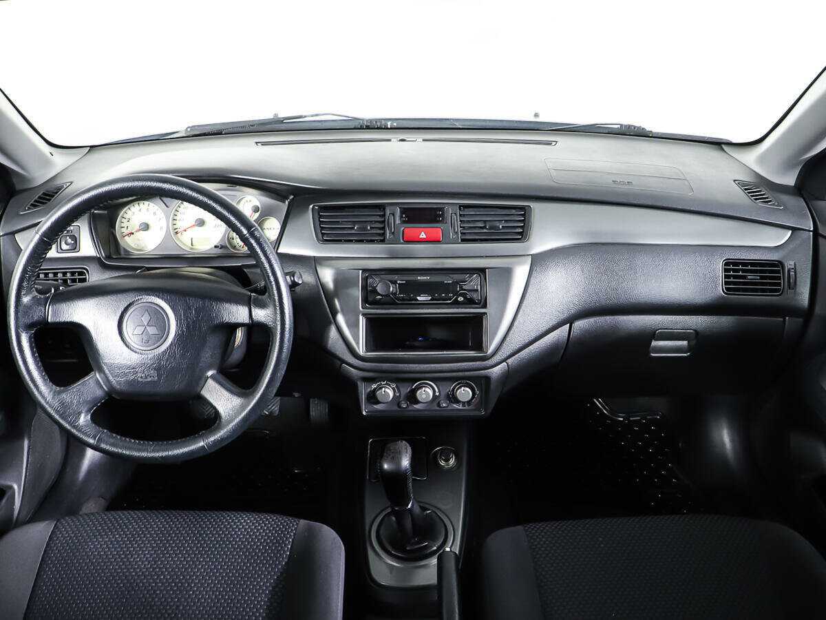 Купить Mitsubishi Lancer с пробегом. Фото: #10