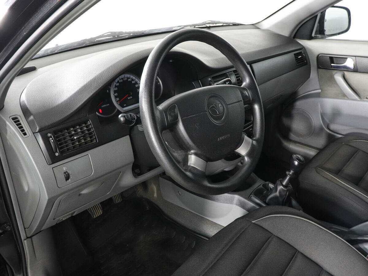 Купить Daewoo Gentra с пробегом. Фото: #4
