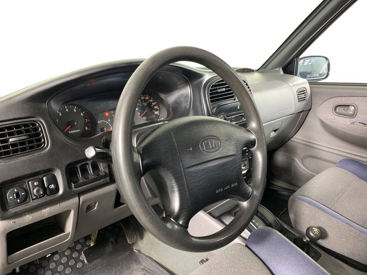 Купить Kia Sportage с пробегом. Фото: #10