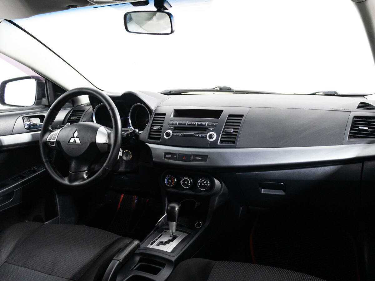 Купить Mitsubishi Lancer с пробегом. Фото: #8