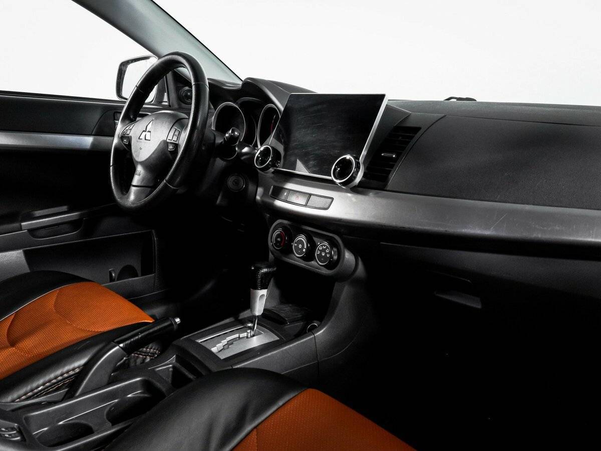 Купить Mitsubishi Lancer с пробегом. Фото: #8