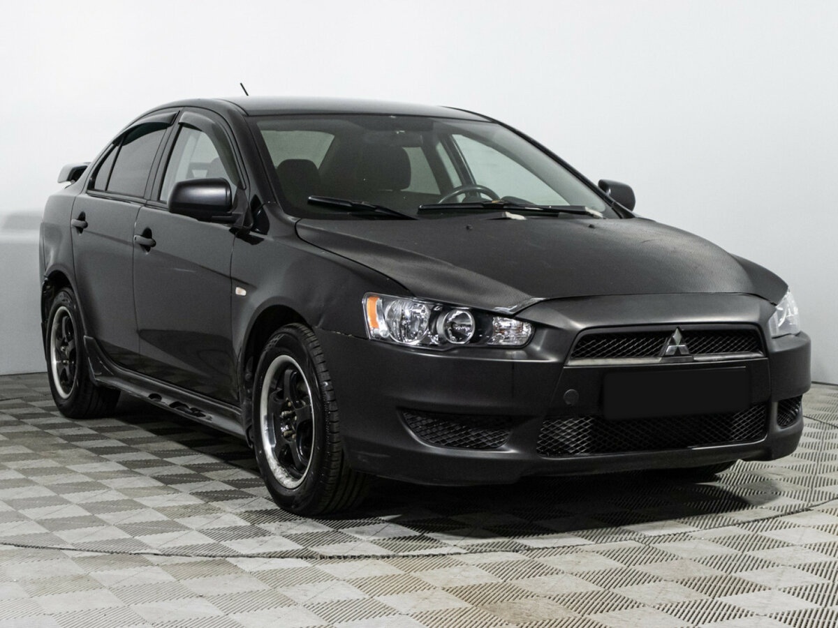 Купить Mitsubishi Lancer с пробегом. Фото: #2
