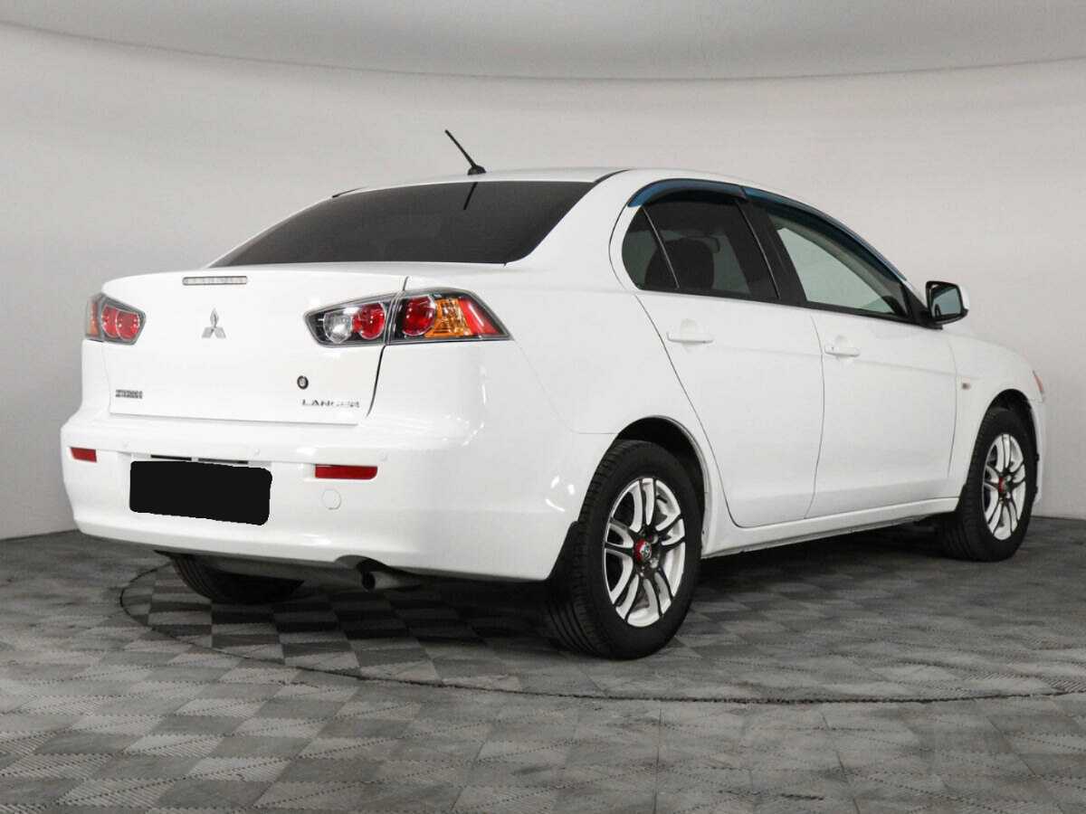 Купить Mitsubishi Lancer с пробегом. Фото: #4