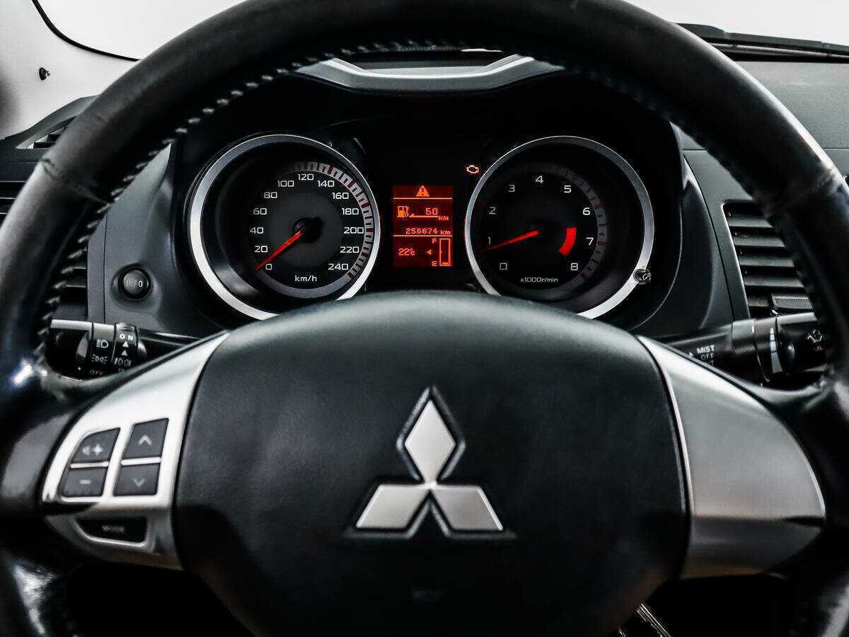 Купить Mitsubishi Lancer с пробегом. Фото: #13