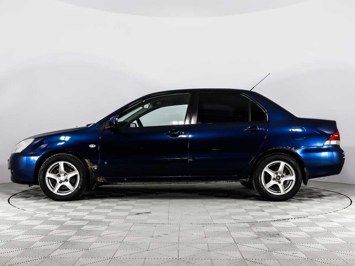 Купить Mitsubishi Lancer с пробегом. Фото: #7
