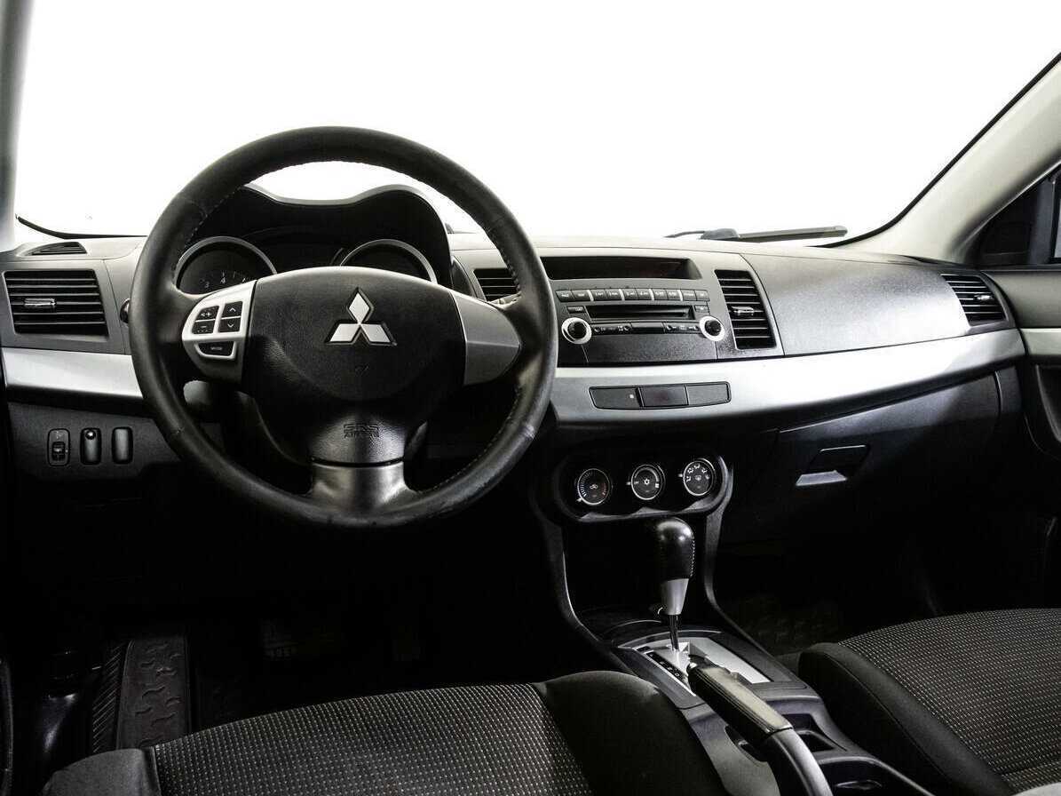 Купить Mitsubishi Lancer с пробегом. Фото: #8
