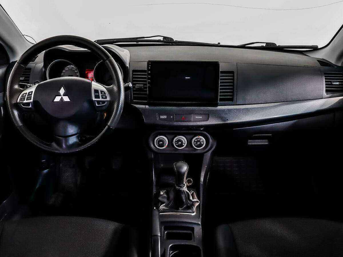 Купить Mitsubishi Lancer с пробегом. Фото: #11
