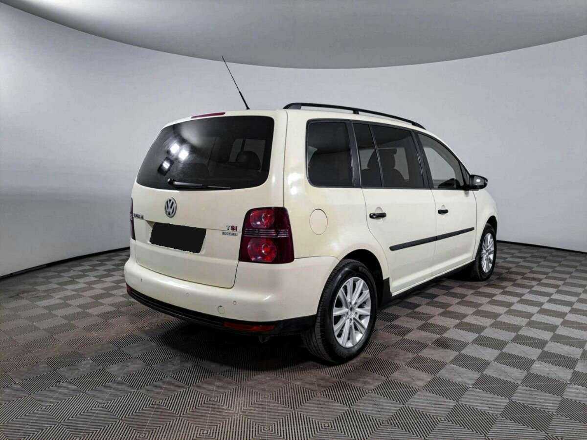 Купить Volkswagen Touran с пробегом. Фото: #4