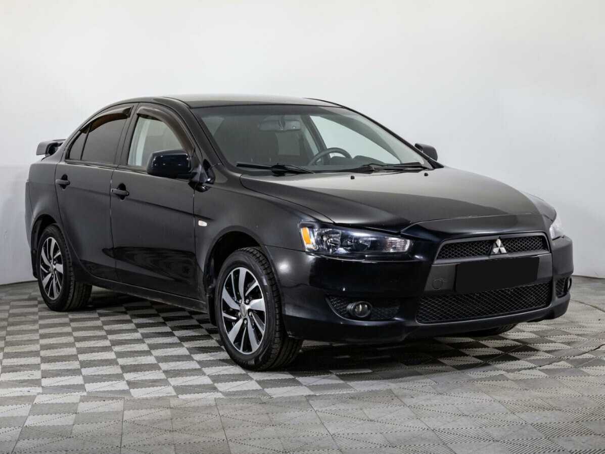 Купить Mitsubishi Lancer с пробегом. Фото: #2