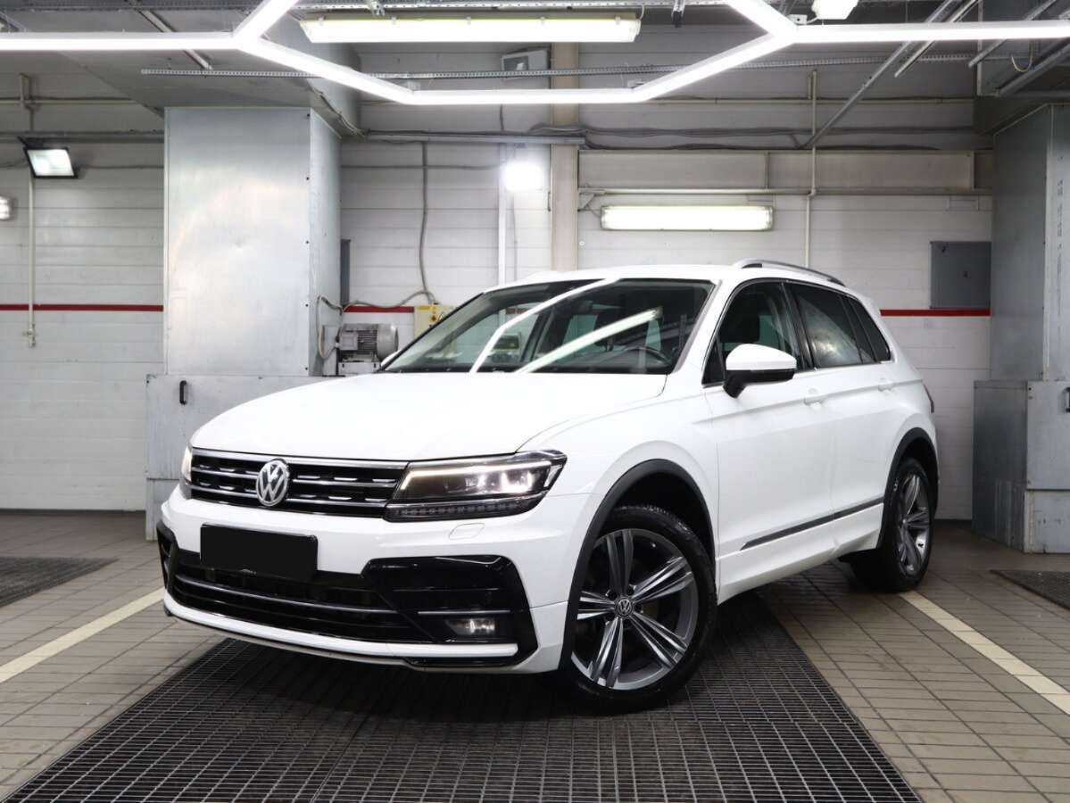 Купить Volkswagen Tiguan с пробегом. Посмотреть фото