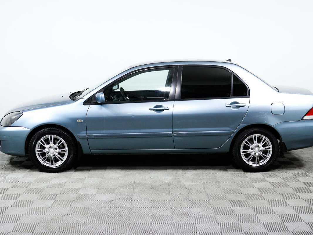 Купить Mitsubishi Lancer с пробегом. Фото: #7